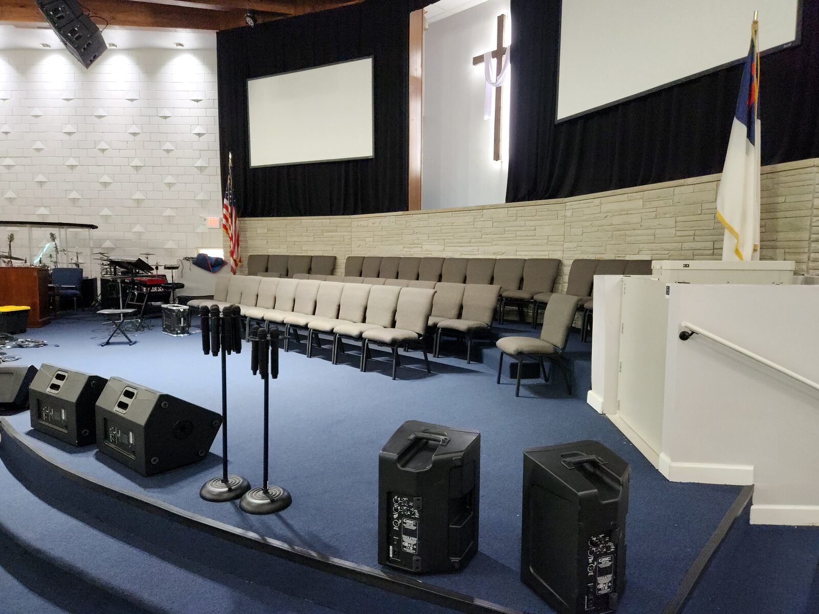 Mt. Gilead Missionary Baptist Church fellowship hall — completed commercial carpet tile with blue seating — Nashville