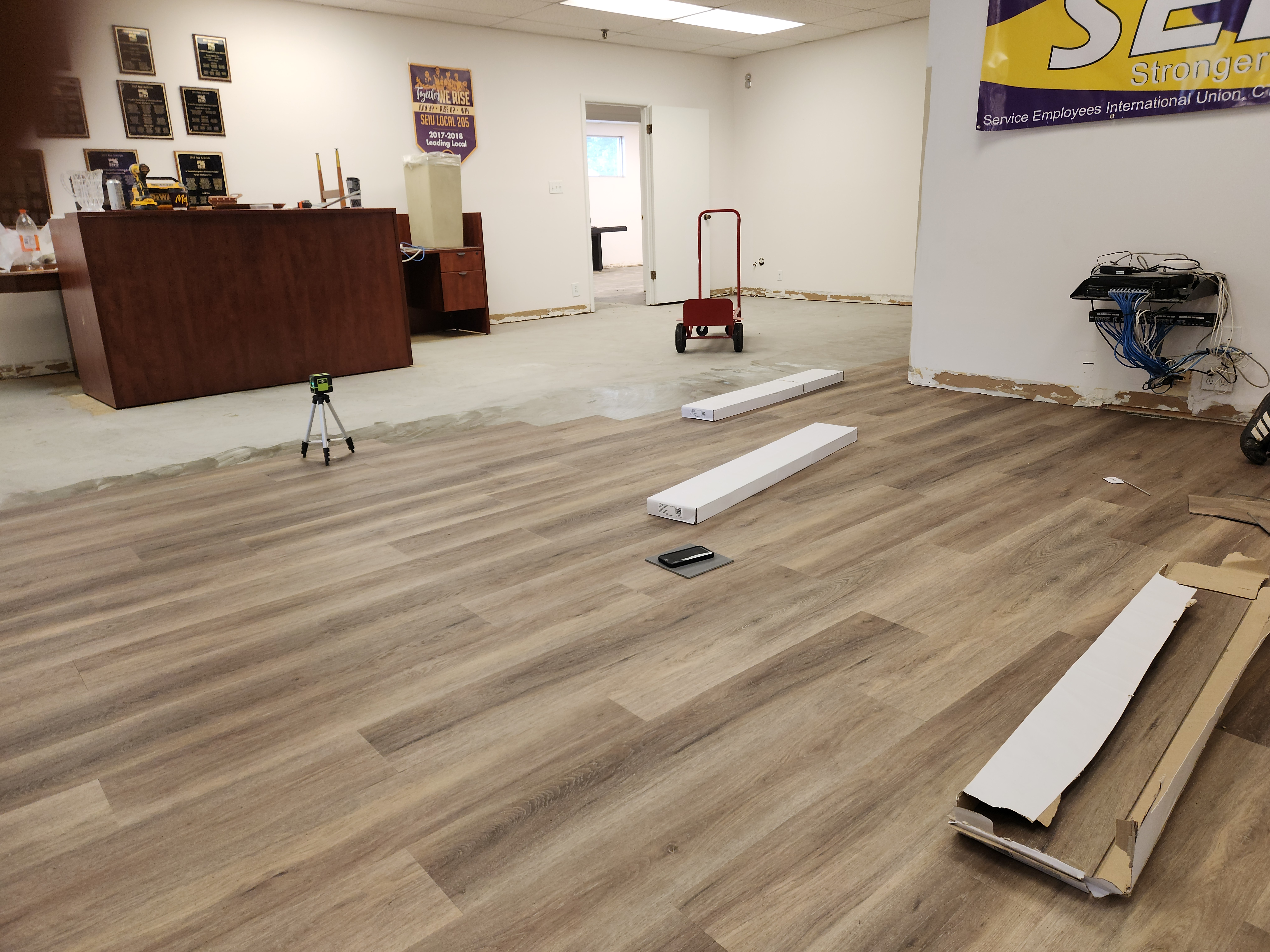 LVP flooring installation in progress at SEIU Local 205 office Nashville