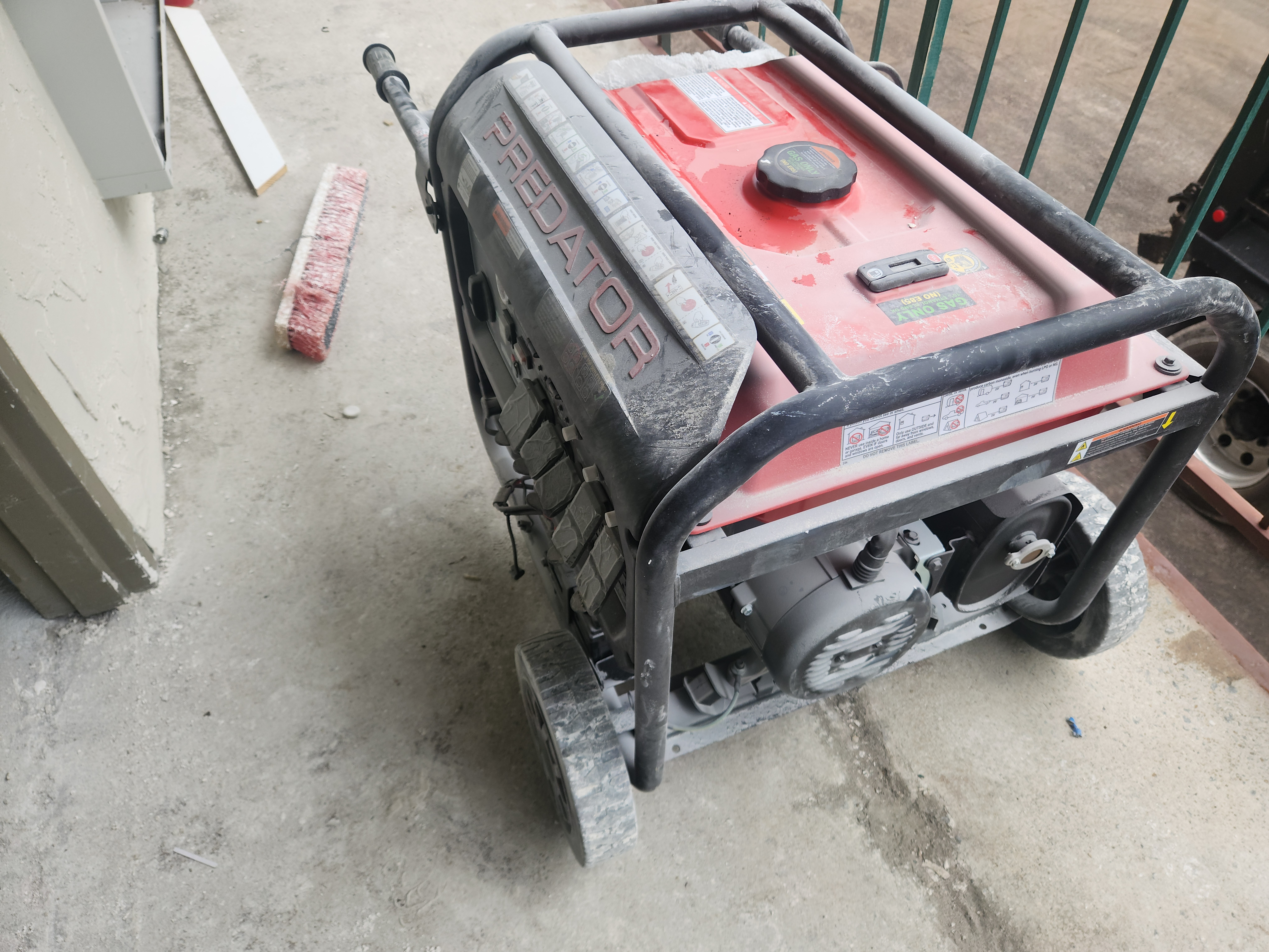 Predator generator powering concrete grinding equipment on a Nashville renovation with no building power available